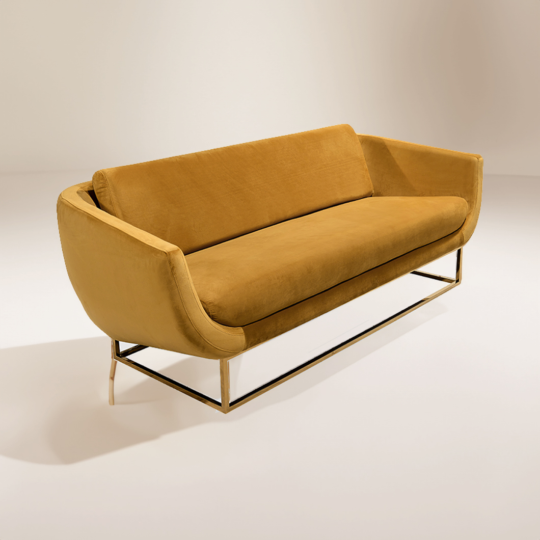 mustard upholstered Solitaire sofa with single bench cushion wrapped in velvet. metal base